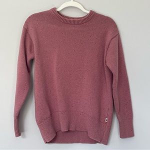 The North Face pink sweater with black and white speckles. Size S